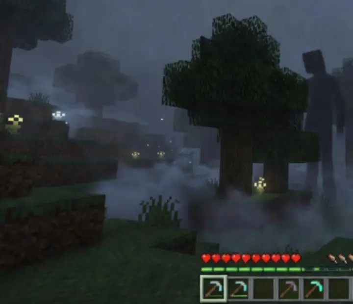 Showcase of the Man from the Fog horror mod in a misty Minecraft biome